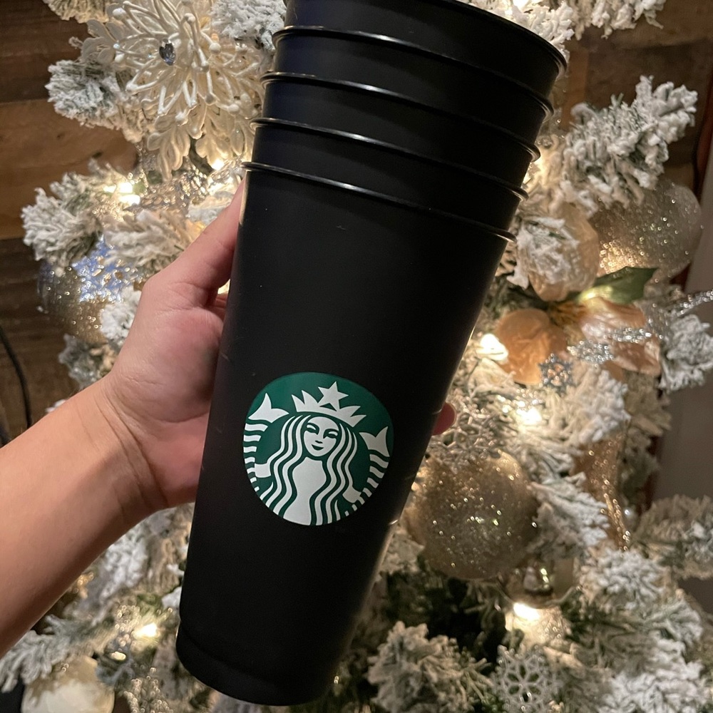 Five Matte Black Starbucks Cups